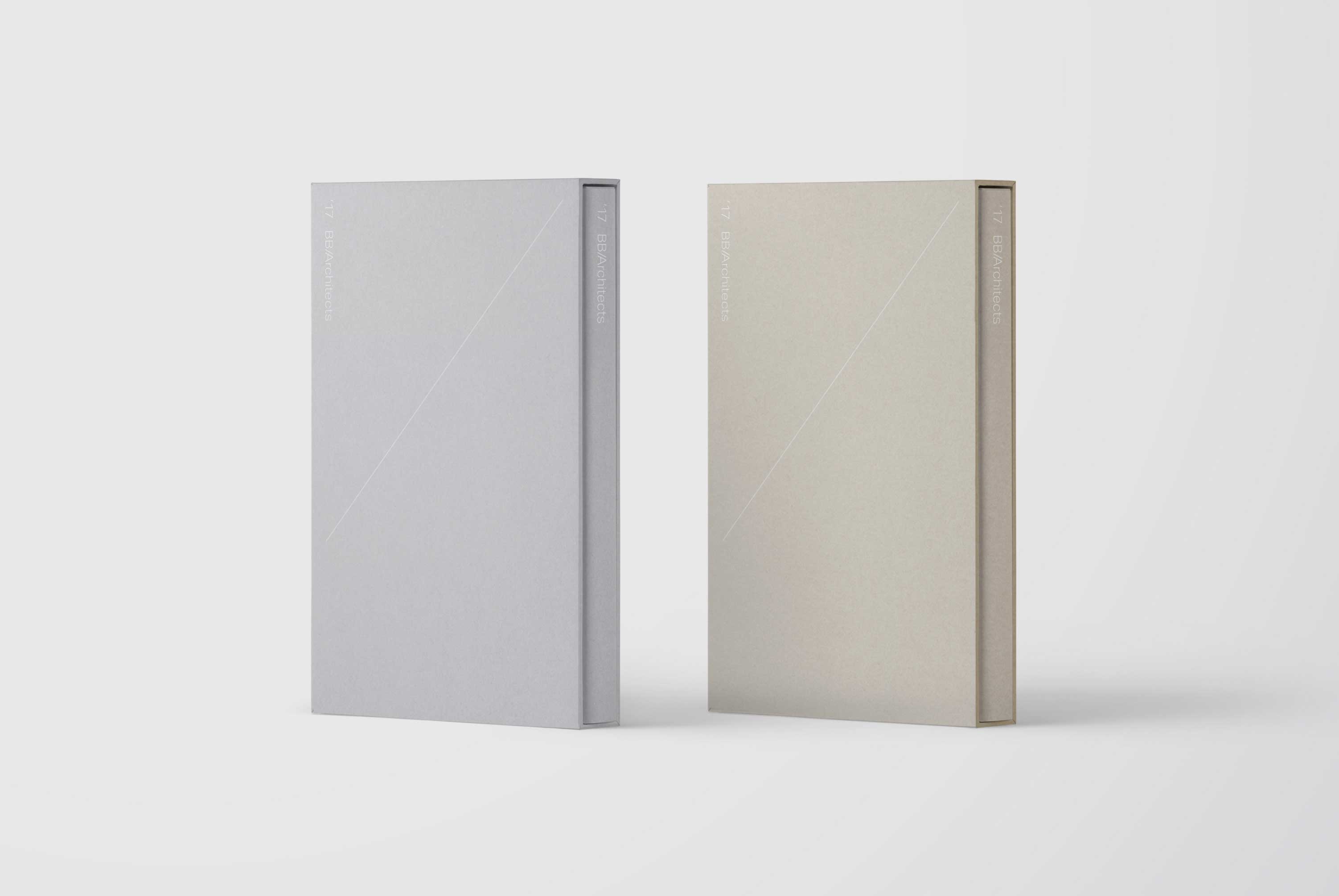 Two books on a grey background