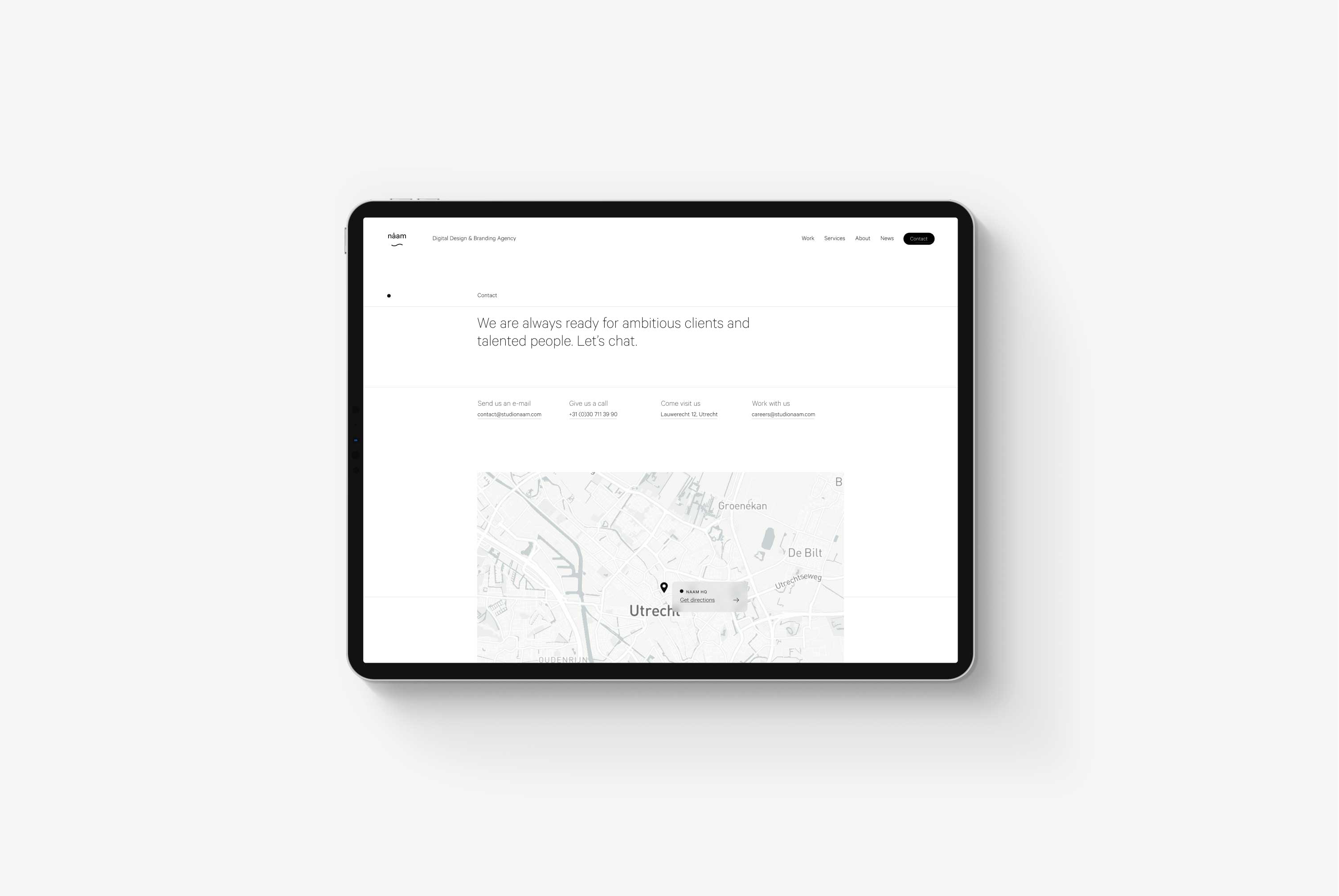 A tablet on a grey background displaying Naam Agency's contact page